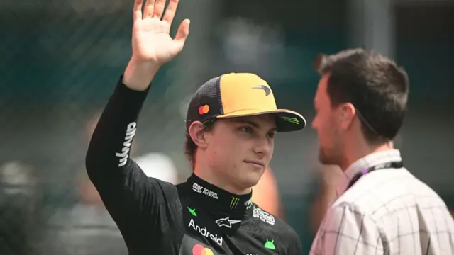 Oscar Piastri thanks the crowd after finishing 2nd in the sprint at Spa.