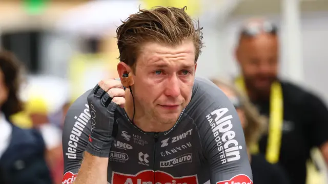 Kaden Groves looking emotional after winning stage 20 of the Tour de France