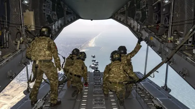 Army personnel from 47 Air Despatch Squadron load aid from Jordan and the UK onto an RAF A400M Atlas from RAF Brize Norton. 12000 Kgs of aid was dropped into Northern Gaza