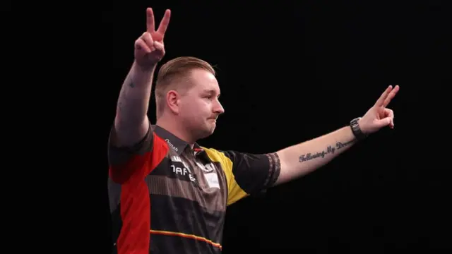 Dimitri Van den Bergh celebrates