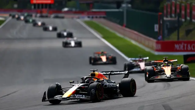 Max Verstappen leads Oscar Piastri at the Belgian GP