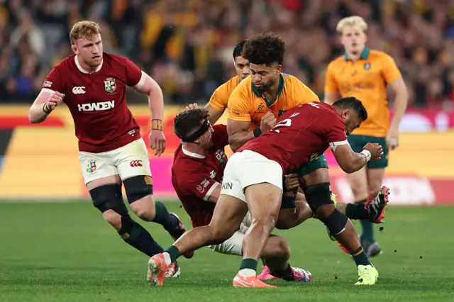 Rob Valetini of the Wallabies is tackled