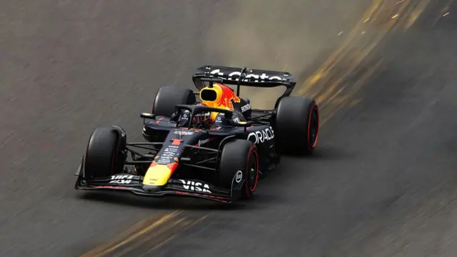 Sparks fly off Verstappen's car during qualifying at Spa.