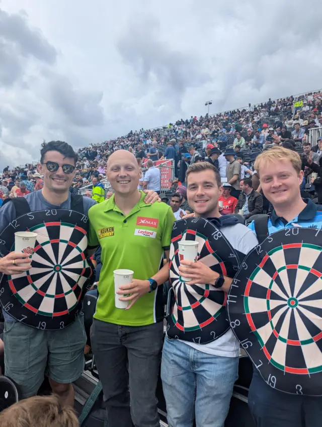 A man dressed as darts player Michael van Gerwen