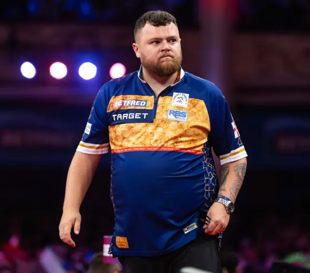 Josh Rock during his game against Luke Littler