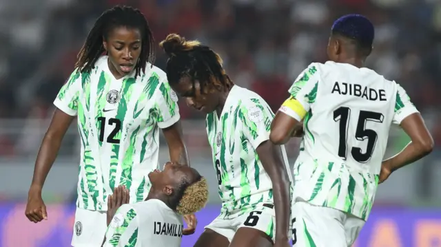 Folashade Ijamilusi celebrates her goal for NIgeria against Morocco