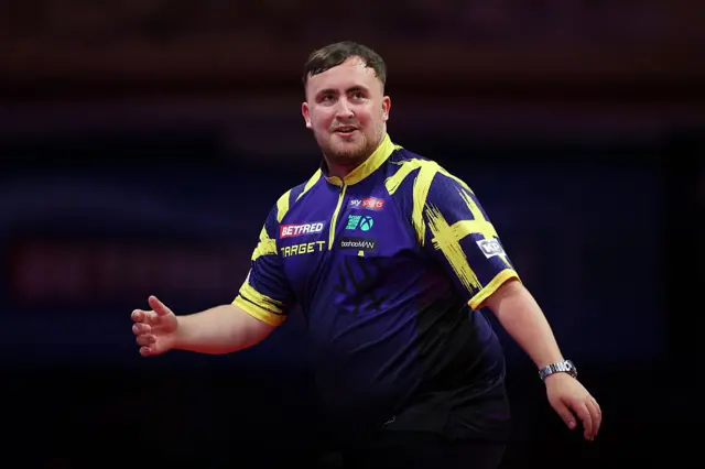Luke Littler reacts against Josh Rock
