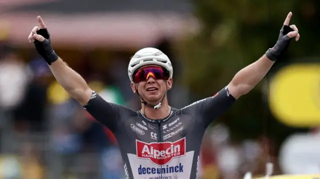 Kaden Groves celebrates winning stage 20 of the Tour de France