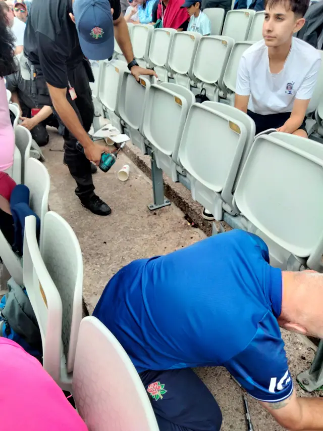 A seat being fixed