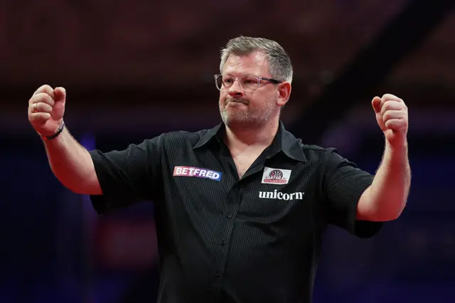 James Wade celebrates during World Matchplay match against Jonny Clayton