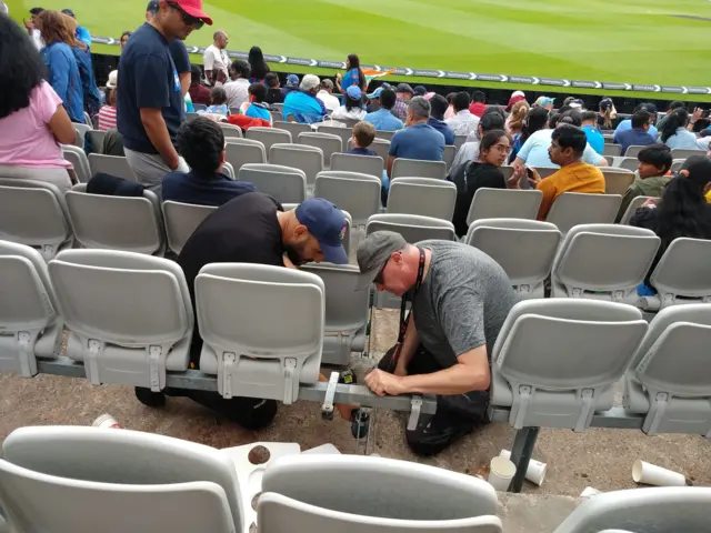 Seats being fixed