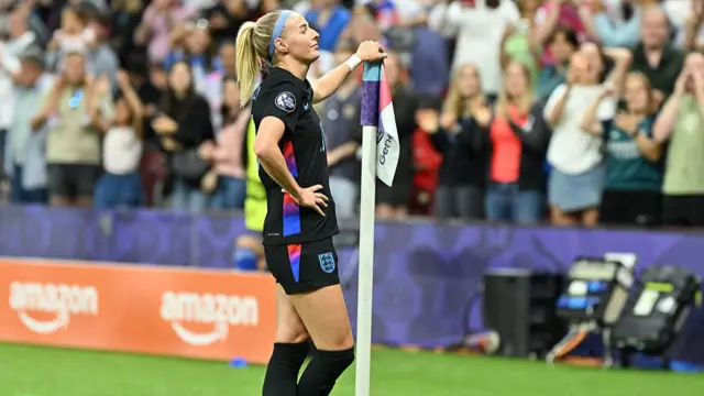 Chloe Kelly of England celebrates after scoring during the UEFA Women's EURO 2025 semi-finals match between England and Italy at Stade de Geneve