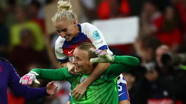Chloe Kelly of England and Hannah Hampton of England celebrate after winning the UEFA Women's EURO 2025 Final match between England and Spain at St. Jakob-Park