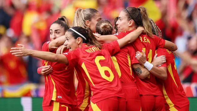 Mariona Caldentey of Spain celebrates scoring her team's first goal with teammates