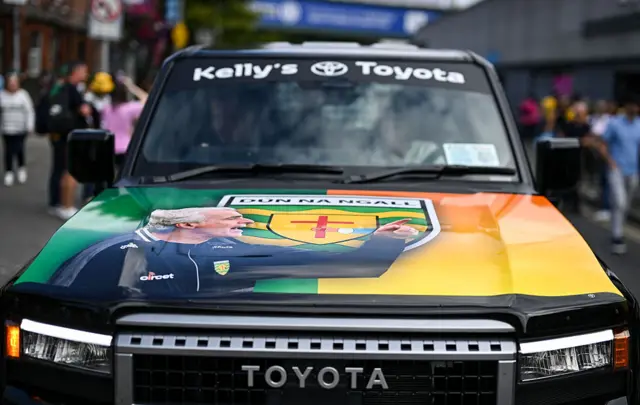 Jim McGuinness on a Toyota car