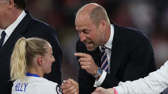 William, Prince of Wales celebrates with Chloe Kelly of England