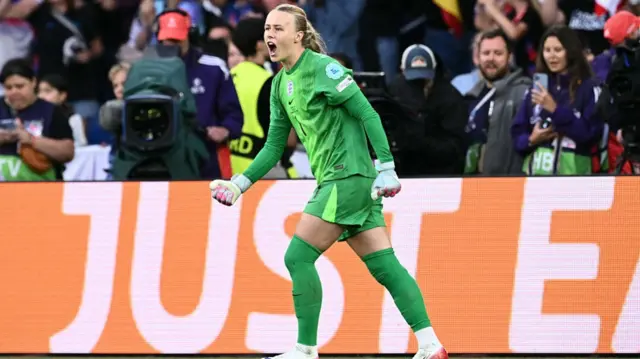 Hannah Hampton celebrates after she saved a penalty during the penalty shootout