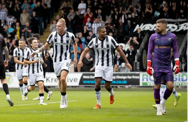 St Mirren's Killian Phillips (centre left) celebrates scoring to make it 2-0 while Ayr's David Mitchell looks dejected