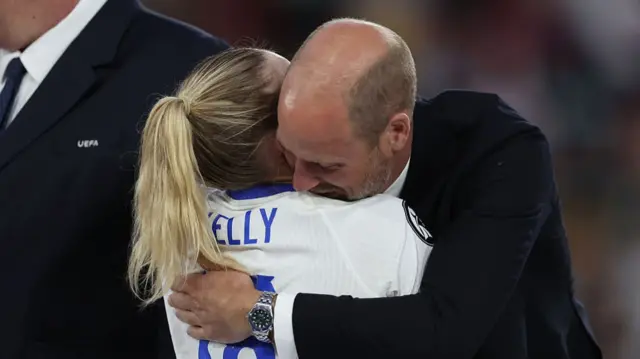 William, Prince of Wales celebrates with Chloe Kelly of England