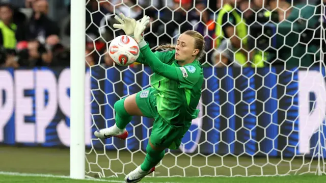 Hannah Hampton of England saves the second penalty from Mariona Caldentey of Spain