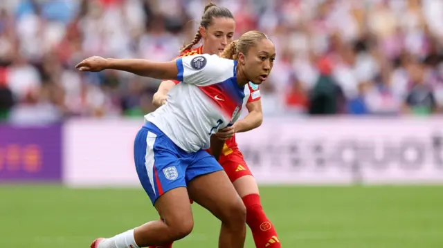 Lauren James of England is challenged by Ona Batlle of Spain during the UEFA Women's EURO 2025 Final match between England and Spain at St. Jakob-Park