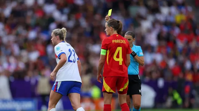 Alessia Russo of England is shown a yellow card by Referee Stephanie Frappart