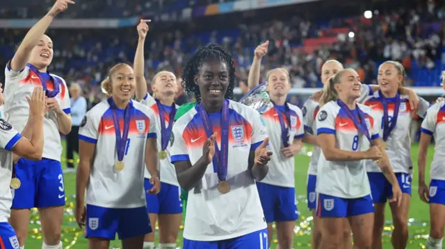 Michelle Agyemang of England celebrates with team mates