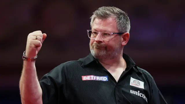 James Wade celebrates his win over Jonny Clayton