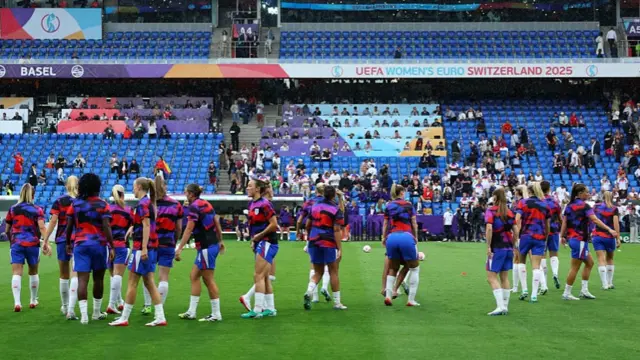 A general view as England players warm up prior to the UEFA Women's EURO 2025 Final match between England and Spain at St. Jakob-Park