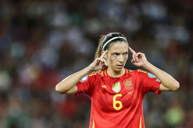 Aitana Bonmati points to head during semi-final against Germany in Euro 2025