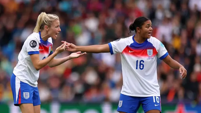Leah Williamson and Jessica Carter of England react during the UEFA Women's EURO 2025 Final match between England and Spain at St. Jakob-Park