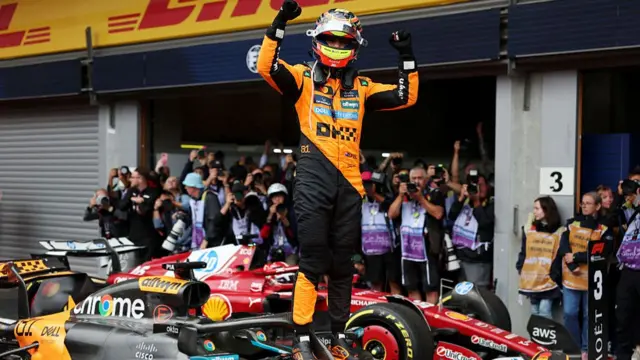 Oscar Piastri celebrates the win at Spa.