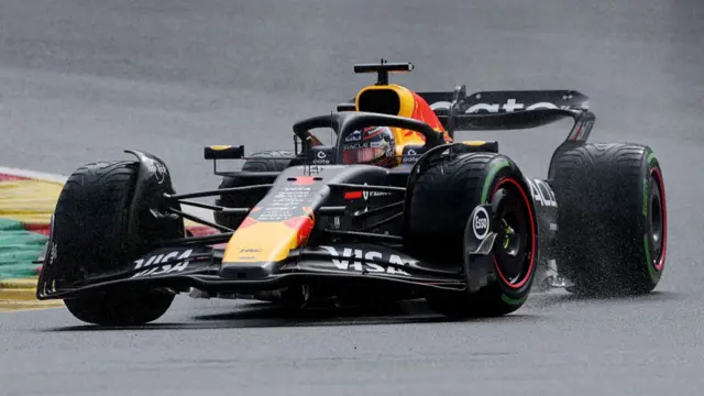 Max Verstappen on intermediate tyres at Spa.