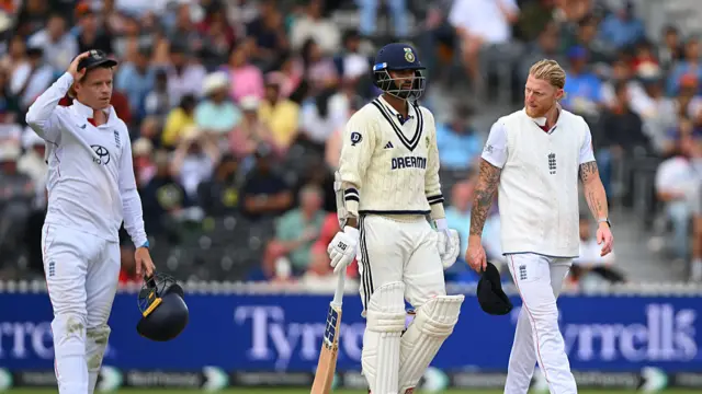 Ben Stokes looking at Washington Sundar