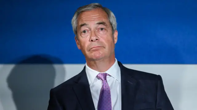 Reform UK Party leader Nigel Farage speaks at a press conference.
