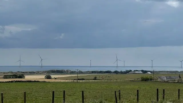 windmills are visible in the distance from Trump's original aberdeen property.