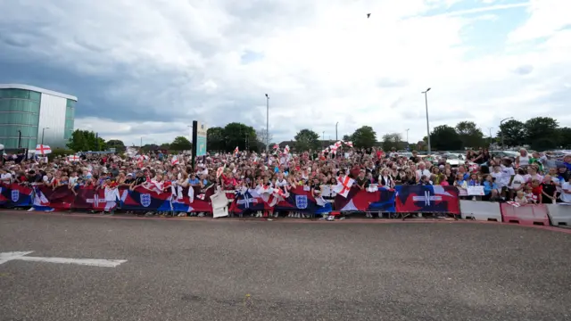 England fans waiting outside London Southend Airport