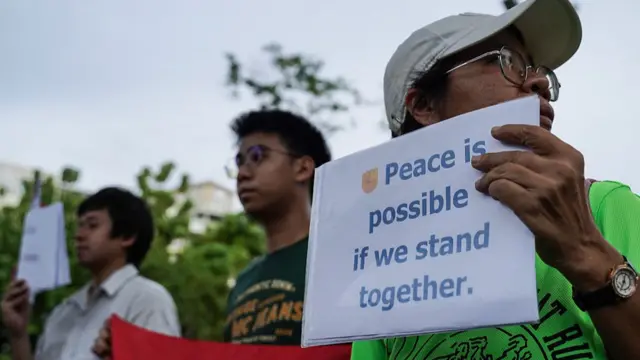 Activists have taken to the streets in Bangkok to call for an end to the conflict