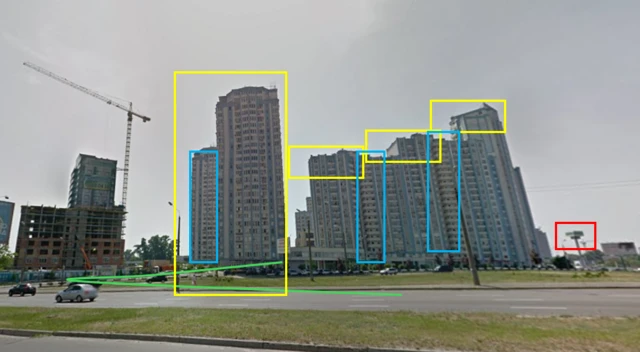 A still image from Google Maps, it showins several tall buildings used to geolocate the location of the attack. Yellow, blue and red boxes are use to draw attention to the buildings and features that are matched.