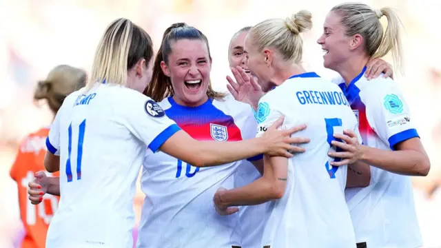 Ella Toone of England celebrates with teammates after scoring