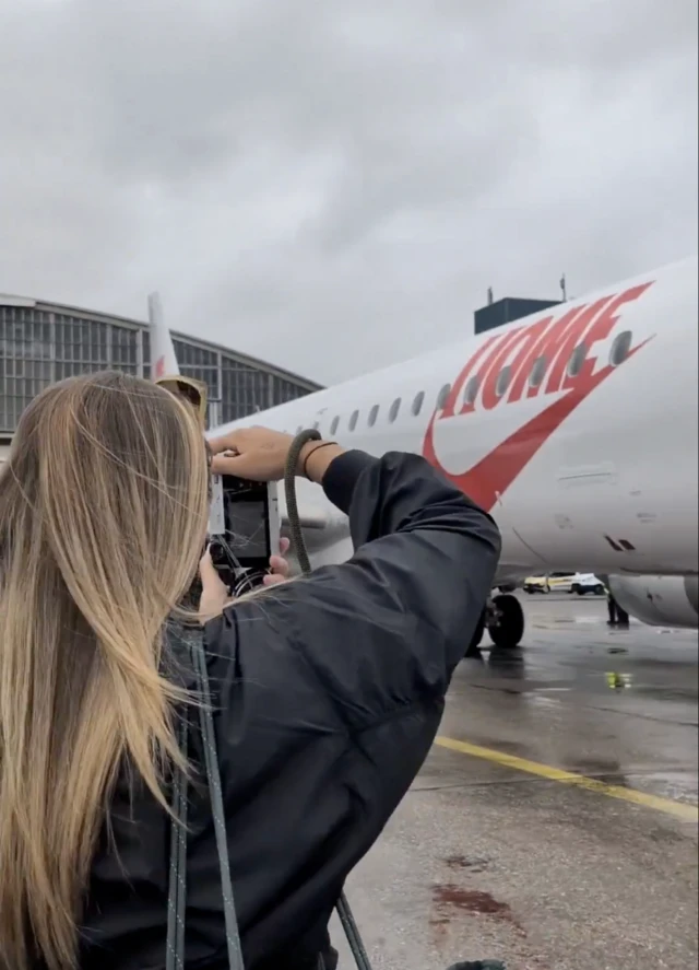 Stanway taking a picture of the plane
