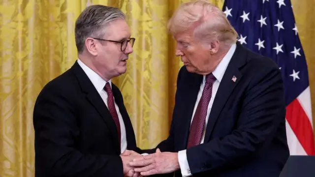U.S. President Donald Trump and British Prime Minister Keir Starmer shake hands at a press conference