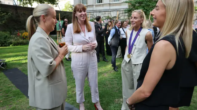 Deputy Prime Minister Angela Rayner (second left) speaks with Beth Mead (left), Alex Greenwood (second right) and Chloe Kelly (right) of the England women's football team