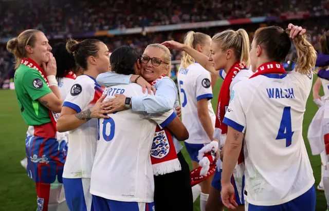 Sarina Wiegman hugs Jess Carter