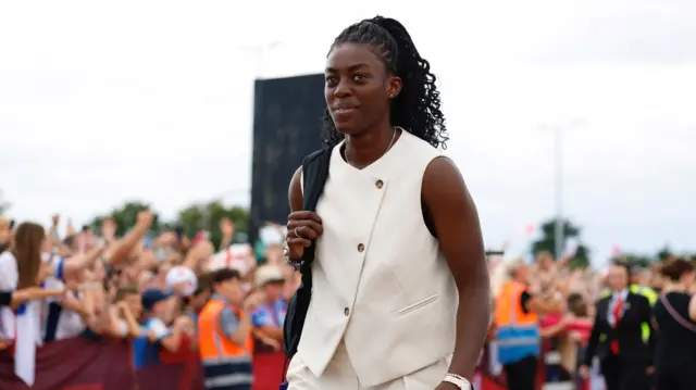 Michelle Agyemang waving