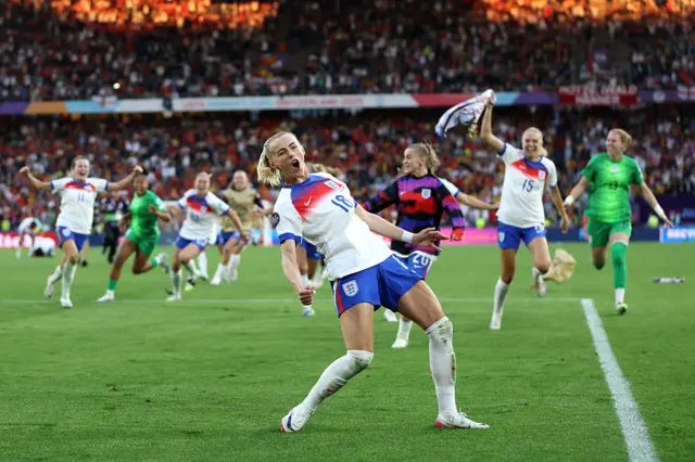Chloe Kelly celebrates after scoring her winning penalty