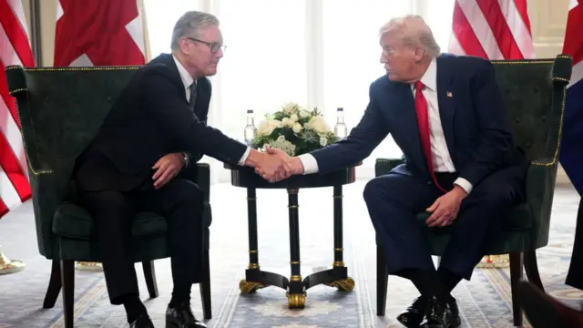 trump and starmer shake hands