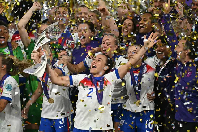 Lucy Bronze celebrates with Euro 2025 trophy