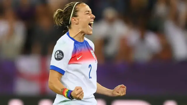Lucy Bronze of England celebrates
