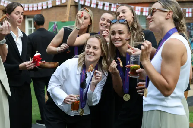 Members of the England women's football team poses for a picture during the reception at No 10 Downing Street, L